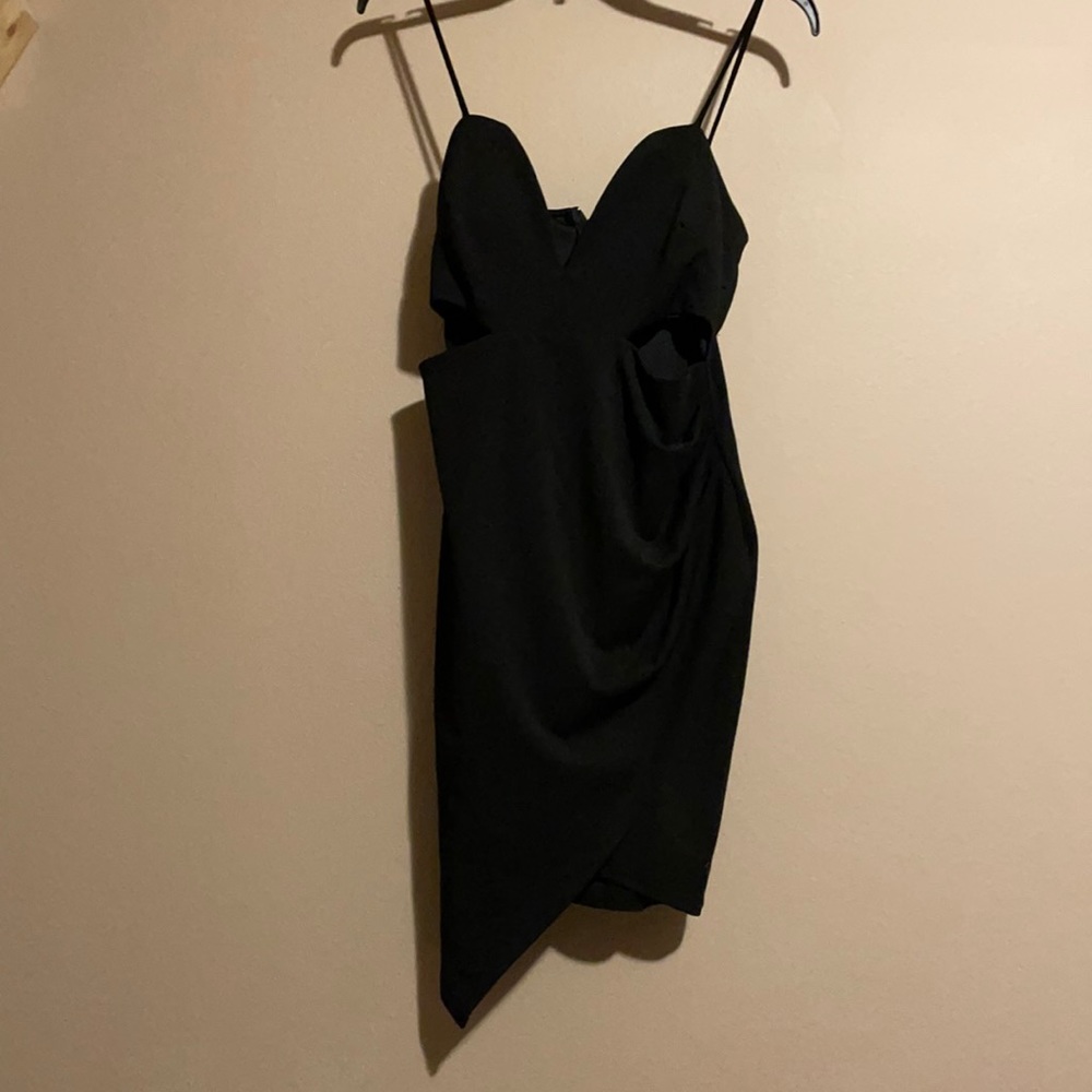 Size medium Windsor cocktail dress with cutouts.